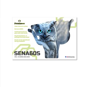 May include: A white and blue decal featuring an owl with bright blue eyes. The decal is for a SENA60S product and includes instructions for application. The StickerBao logo is visible in the upper left corner.