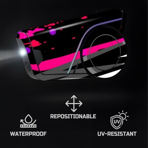 May include: Black device with a bright white light, decorated with pink, red, and purple splatters. The device has a circular design element with gray and white stripes. Text on the image reads "WATERPROOF", "REPOSITIONABLE", and "UV-RESISTANT".