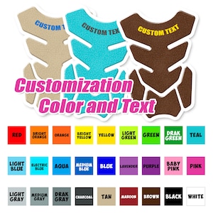 May include: Three motorcycle tank pads with different colors and textures. The pads are beige, turquoise, and brown. The text "CUSTOM TEXT" is printed on each pad. A color chart with various colors is shown below the pads.