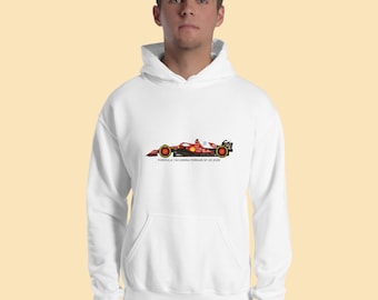 May include: White hooded sweatshirt with a red and black Formula 1 race car graphic on the front. The text "FORMULA 1 SCUDERIA FERRARI GP DE 2022" is printed below the car.