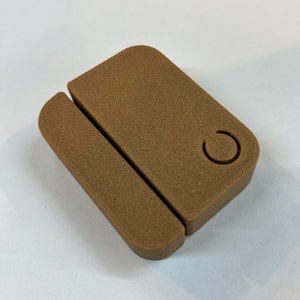 Ring Entry Sensor Covers in Black and Brown Oak