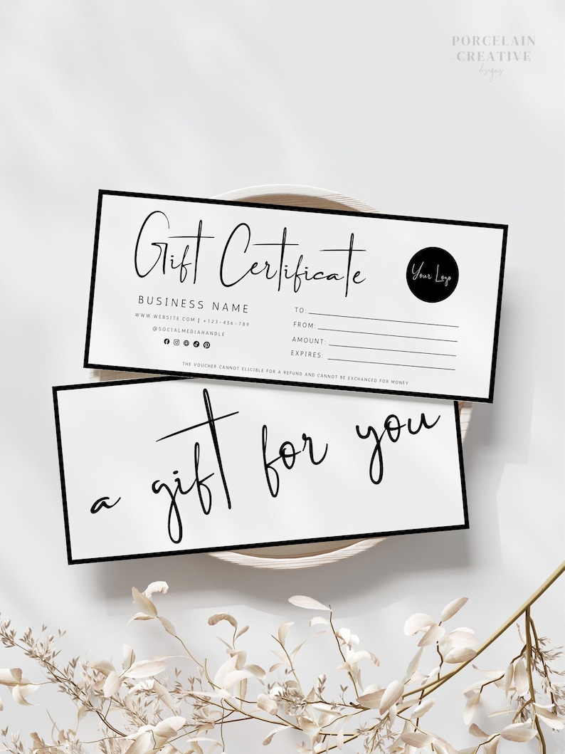 May include: A black and white gift certificate template with the text "Gift Certificate" in a handwritten font. The template includes space for the business name, website, phone number, social media handle, to, from, amount, and expires. The text "a gift for you" is written in a handwritten font on a separate card.