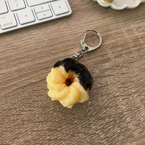 Cruller Chocolate Dipped with Cream Center,BUTTER Keychain,Whimsical Keychain,Gift For Pastry Lovers,Kawaii keychain,cute keychain, handmade