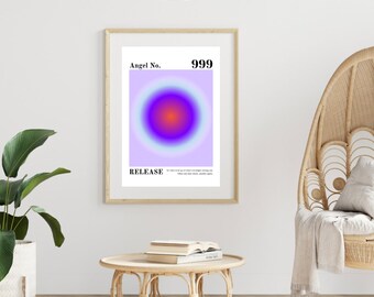 Puede incluir: Una impresión enmarcada con un círculo degradado morado y azul en el centro. El texto "Angel No. 999" está en la parte superior de la impresión y la palabra "RELEASE" está en la parte inferior.
