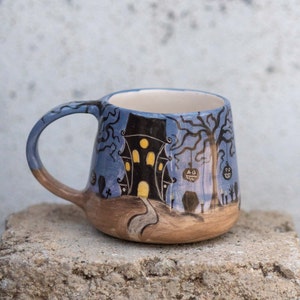 haunted house coffee mug