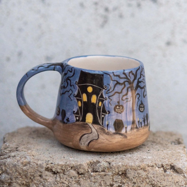 haunted house coffee mug