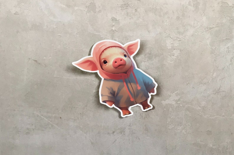 May include: A pink pig wearing a light blue hooded sweatshirt with a pink hood. The pig is looking at the camera.