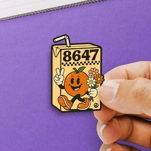 May include: A sticker featuring a cartoon orange character holding flowers and giving a peace sign. The orange is on a juice box with the number 8647. The sticker has a retro, vintage design with a peace symbol.