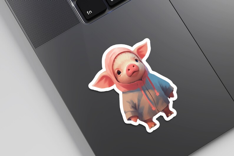 May include: A pink pig wearing a pink and blue hooded jacket. The pig is looking at the camera with a curious expression.