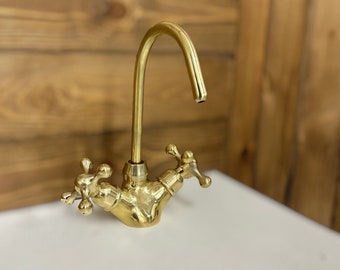 Rubinetto per lavabo da bagno in ottone massiccio non laccato, a foro singolo, con maniglia a croce.