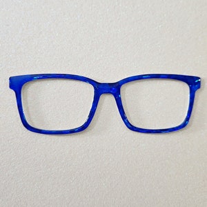 May include: A pair of blue plastic eyeglasses with a rectangular frame.
