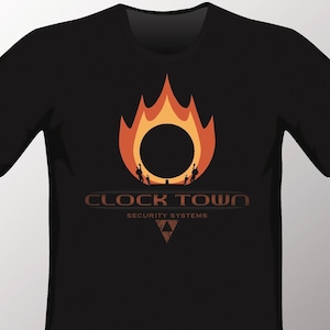 May include: Black t-shirt with a graphic of a fiery circle with silhouettes of people standing around it. The text "CLOCK TOWN SECURITY SYSTEMS" is below the graphic.