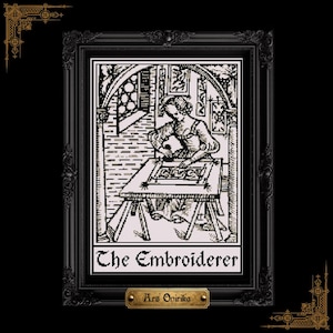 May include: Framed black and white print of an embroidery scene. The image shows a person at work, with the text "The Embroiderer" beneath. The frame is ornate, and the artist's name, "Ars Onirika," is on a small plaque at the bottom.