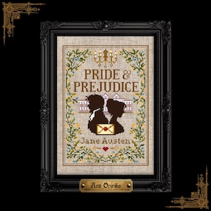 May include: A cross-stitch embroidery of Pride & Prejudice by Jane Austen, featuring silhouettes of a couple, a chandelier, and a letter, framed in a black ornate frame with a gold plaque reading Ars Onirika on a beige fabric background.