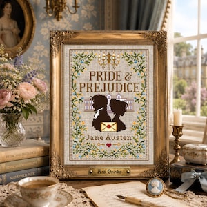 May include: A framed cross-stitch embroidery featuring the text Pride & Prejudice and Jane Austen, with silhouettes of a couple, a letter, and a chandelier, surrounded by a floral border in a gold ornate frame with an Ars Ovirika nameplate.
