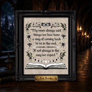 May include: A framed cross-stitch embroidery on beige fabric featuring black text that reads: My mum always said things we lose have a way of coming back to us in the end. If not always in the way we expect. Includes motifs of a book, moon phases, and winged creatures.