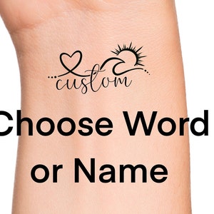 May include: A temporary tattoo with a heart, sun, and wave design. The word "custom" is written in cursive below the design. The text "Choose Word or Name" is written below the tattoo.