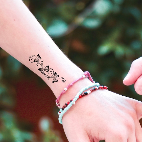 Top 30 Amazing Bracelet Tattoo Ideas (2021 Updated) | Wrist bracelet tattoo,  Flower wrist tattoos, Wrap around wrist tattoos