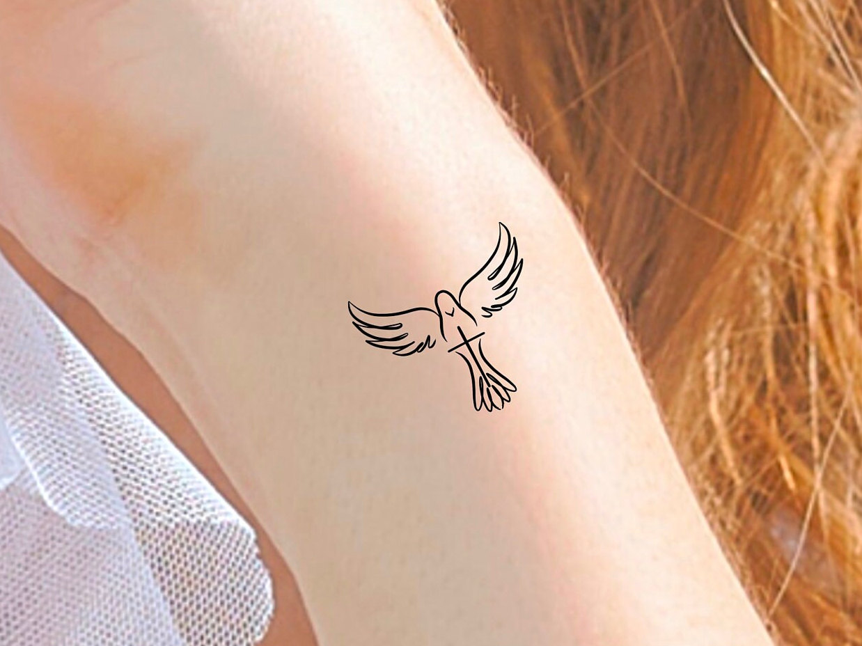 Share 77+ dove holy spirit tattoo super hot - in.coedo.com.vn