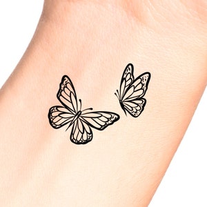 ozytattoo on X butterflies butterfly butterflytattoo blacktattoos  minimaltattoo dovmemodelleri dovme tattoo geometrictattoo blacktattoo  ozytattoo ozytatts tattoos tattooed tattooartist tattooart  tattoolife tattooedgirls tattooist 