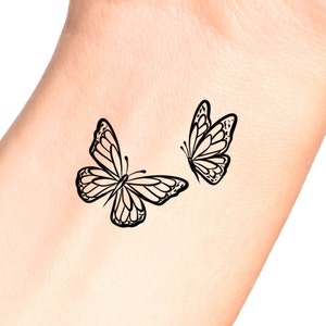 Cute Butterfly Tattoo Wrist Tattoo
