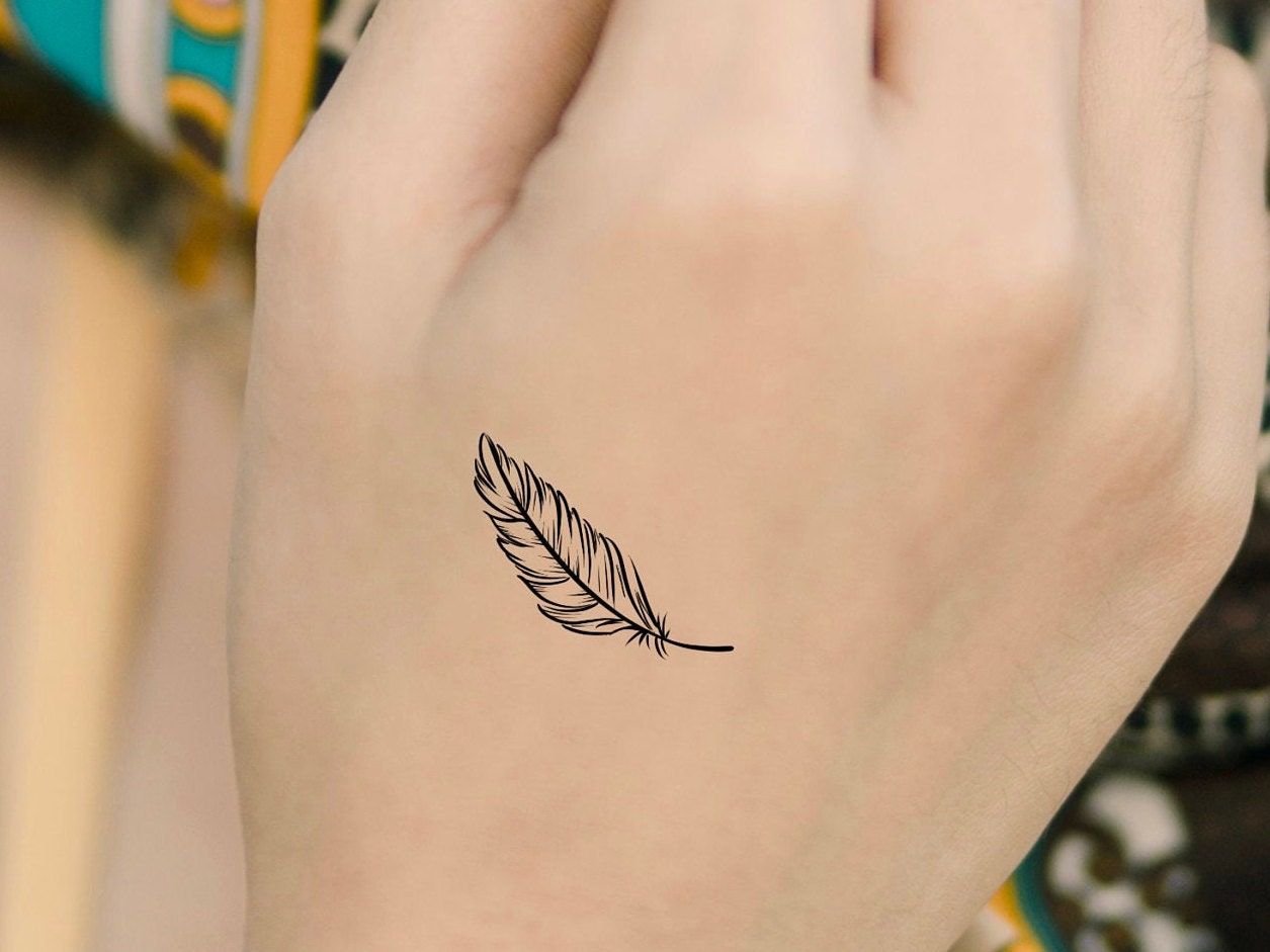 Feather Tattoos A Symbol of Freedom Strength and Beauty
