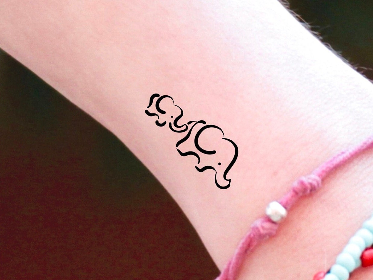 Colorful Small Elephant Tattoo On Wrist
