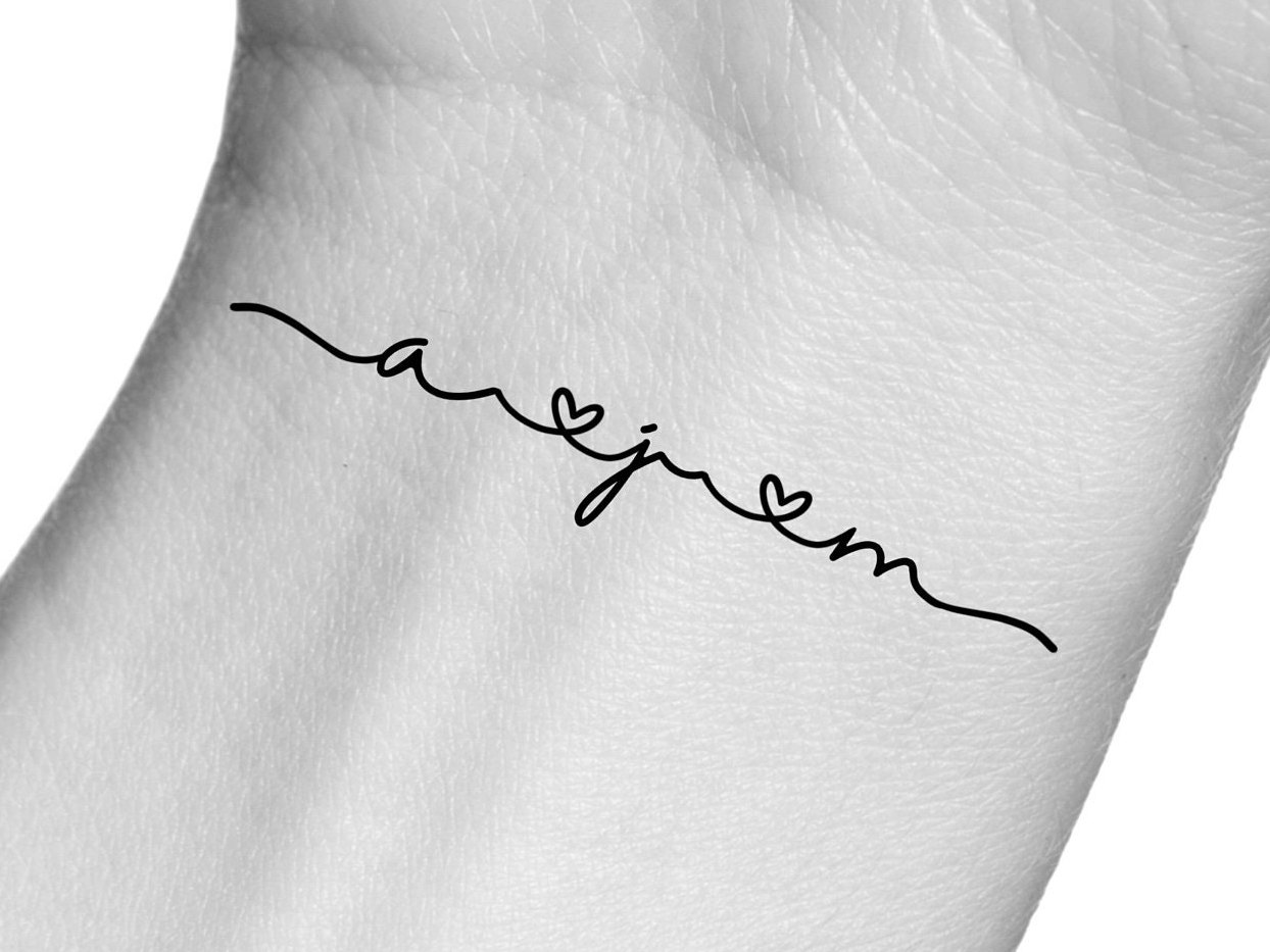 Heartbeat with Name: A Loving Tattoo