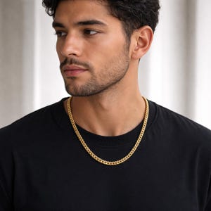 May include: A white ceramic mug with a black handle and the text "But First, Coffee" in a bold, black font. The mug is set against a blurred background, suggesting a cozy setting.