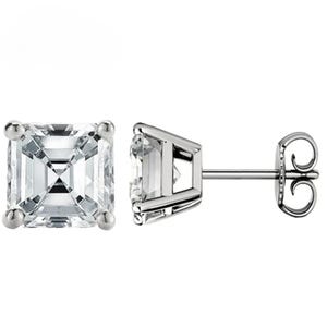 May include: A pair of silver stud earrings with square-shaped clear gemstones. The earrings have a simple design and are perfect for everyday wear.