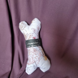 Hueso floral rosa en forma de juguete chirriante Durable lindo hecho a mano gato perro hurón