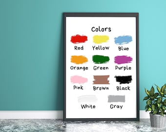 May include: A printable chart with the word "Colors" at the top and color swatches for red, yellow, blue, orange, green, purple, pink, brown, black, white, and gray. Each color swatch is labeled with the corresponding color name.