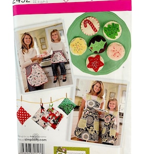 Simplicity pattern 2492 adult and child’s aprons and accessories. UNCUT