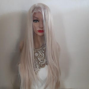 Cream blonde lace front wig human hair blend 13x6 lace front. 24''