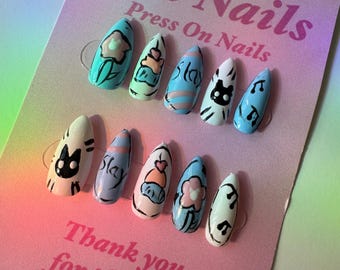 Cartoon Baddie Tips: cartoon + slay-themed press-on nails