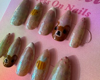 The Honey Tip Set: press-on nails featuring bees, a bear, and French tips