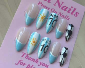 Messi press on nails. medium almond sky blue, black, white and yellow!!