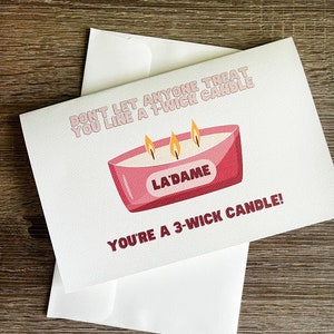 May include: A white card with a pink candle illustration and the text "Don't let anyone treat you like a 1-wick candle. La'Dame. You're a 3-wick candle!"