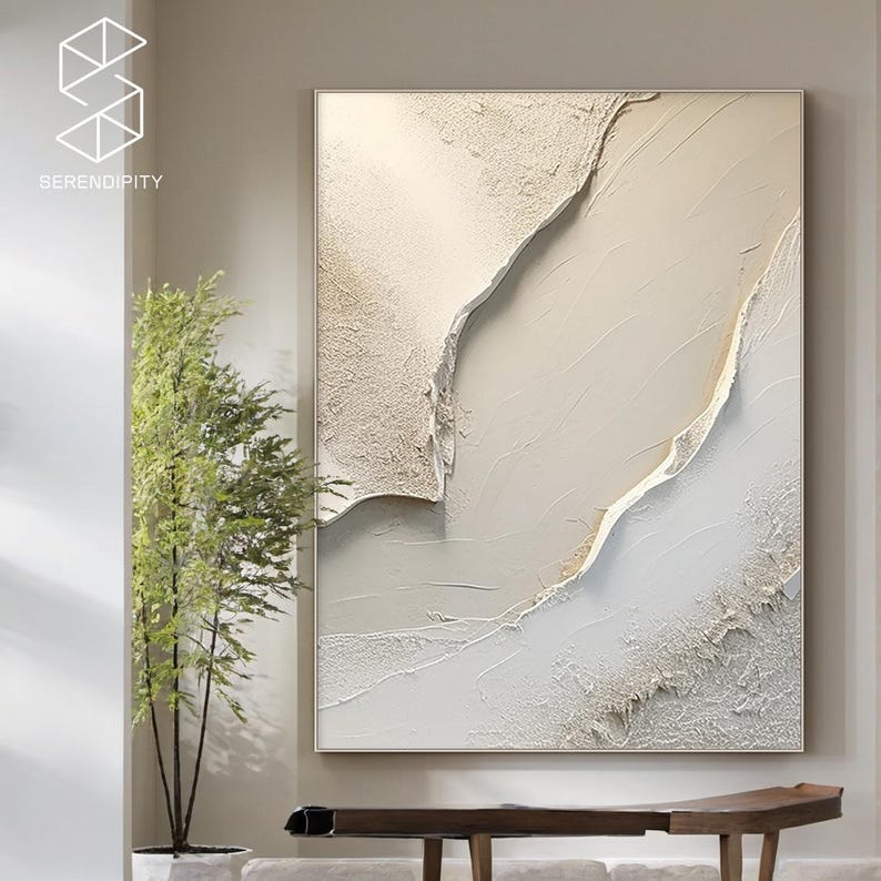 May include: Abstract art print with a white and gold color scheme. The print features a textured, layered design with a modern aesthetic.