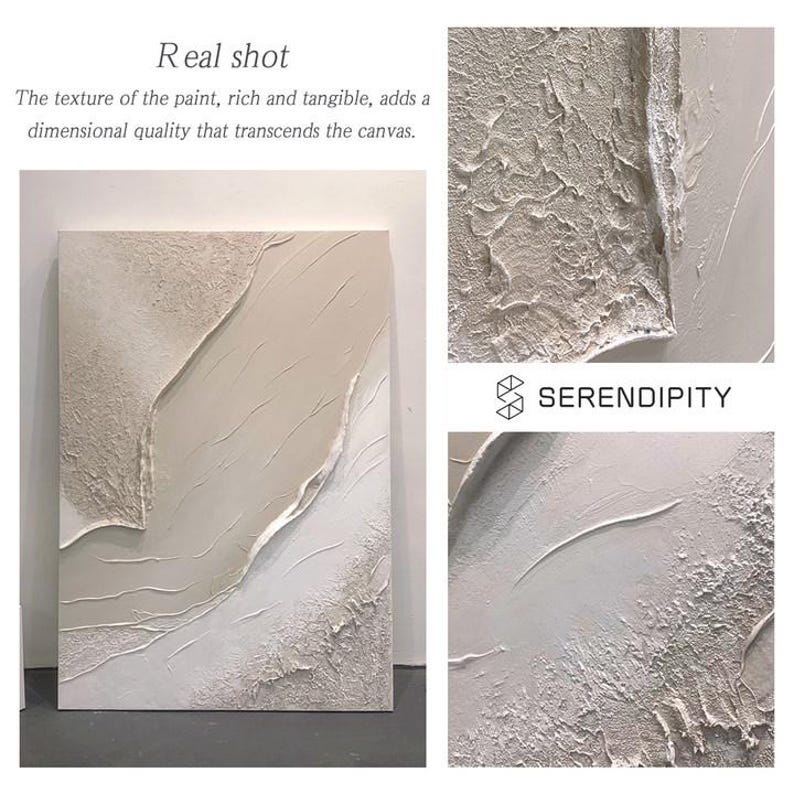 May include: A white and beige abstract painting with a textured surface. The painting has a modern and minimalist style. The text "SERENDIPITY" is visible in the lower right corner of the image.