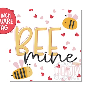 May include: A 2 inch square tag with a white background and pink and red hearts. The text "Bee mine" is written in yellow and black. There are two cartoon bees on the tag.