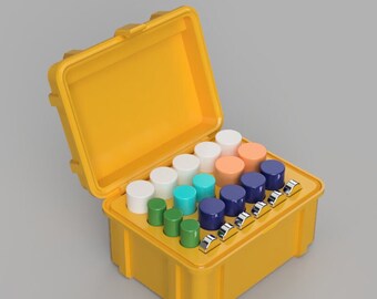 May include: A yellow plastic case with an open lid, containing an array of colourful cylindrical objects. The cylinders are in various colours, including white, green, blue, and orange. The case also has silver metal clasps.