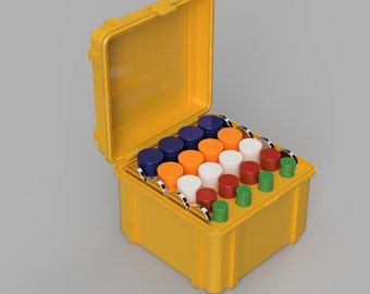 Puede incluir: Una caja amarilla con la tapa abierta que contiene una variedad de objetos cilíndricos de colores. Los cilindros son de varios colores, incluyendo azul, naranja, blanco, rojo y verde. La caja tiene una tapa con bisagras y cierres metálicos.