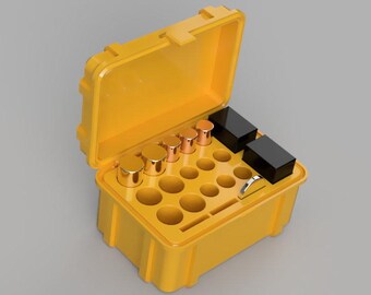 Puede incluir: Una caja de plástico amarilla con una tapa con bisagras, que contiene varios cilindros pequeños de color dorado y dos cajas rectangulares negras. La caja tiene una cuadrícula de compartimentos para organizar los artículos.