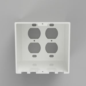 May include: White plastic electrical box with four round openings for electrical outlets.