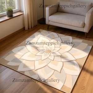 May include: A beige and cream-colored area rug with a large floral design. The rug features a central flower with layered petals in varying shades of beige and cream, creating a soft, inviting aesthetic. The rug is rectangular and appears to be made of a soft material.