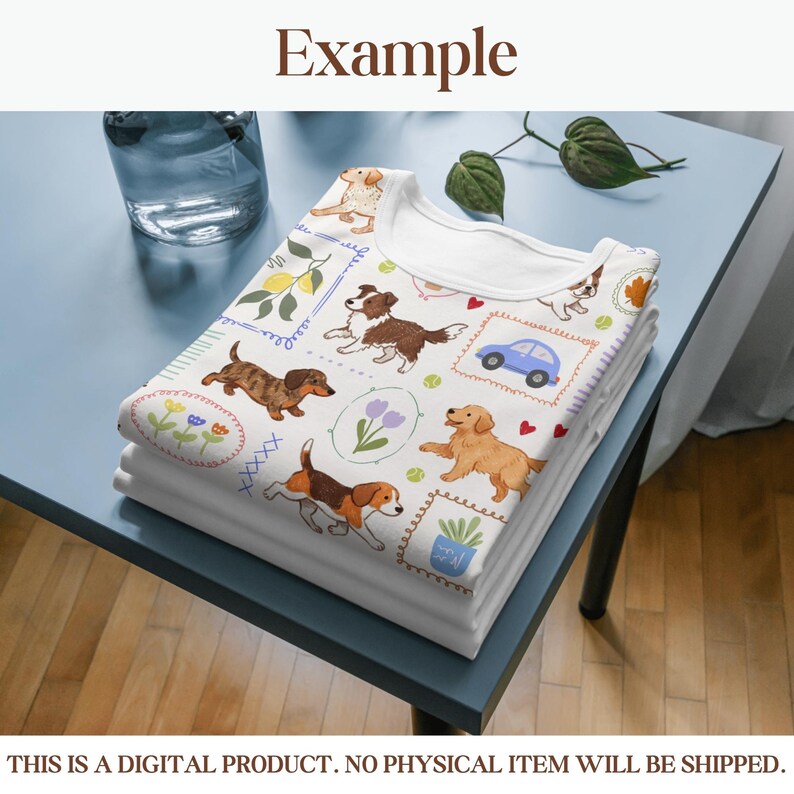 K&ouml;nnte beinhalten: Ein Stapel gefalteter wei&szlig;er T-Shirts mit einem farbenfrohen Muster zum Thema Hunde. Das Muster zeigt verschiedene Hunderassen, Blumen und ein blaues Auto. Der Text "Example" befindet sich oben im Bild.