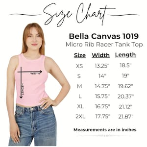 May include: A pink Bella Canvas 1019 Micro Rib Racer Tank Top size chart. The chart shows the width and length measurements in inches for sizes XS to 2XL. The model is wearing the tank top and blue jeans.