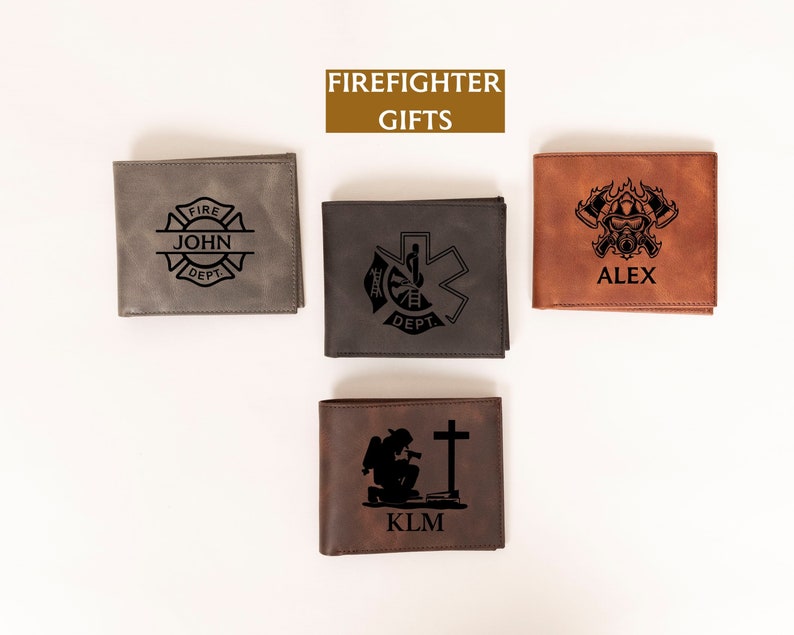 May include: Four different leather wallets with firefighter-themed designs. The wallets are brown, gray, and black. The wallets have the words "FIRE DEPT." and "ALEX" on them.