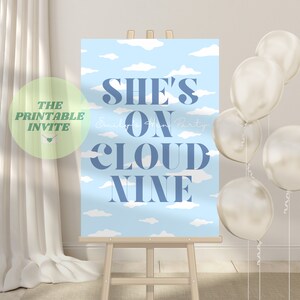 May include: A blue and white printable sign with the text "She's on Cloud Nine" and the words "Emily's Hen Party" in a smaller font. The sign is on an easel and there are white balloons in the background.
